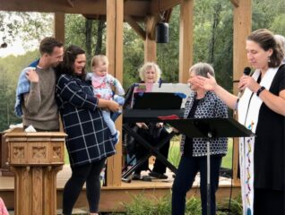 Baptizing one of our youngest.